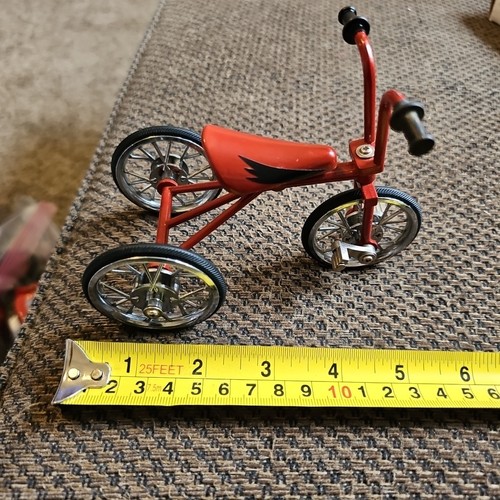 Red miniature tricycle - miniature,